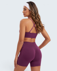 Conjunto Seamless Skinny roxo da VD Beyond Limits com top de alças cruzadas e leggings de cintura subida