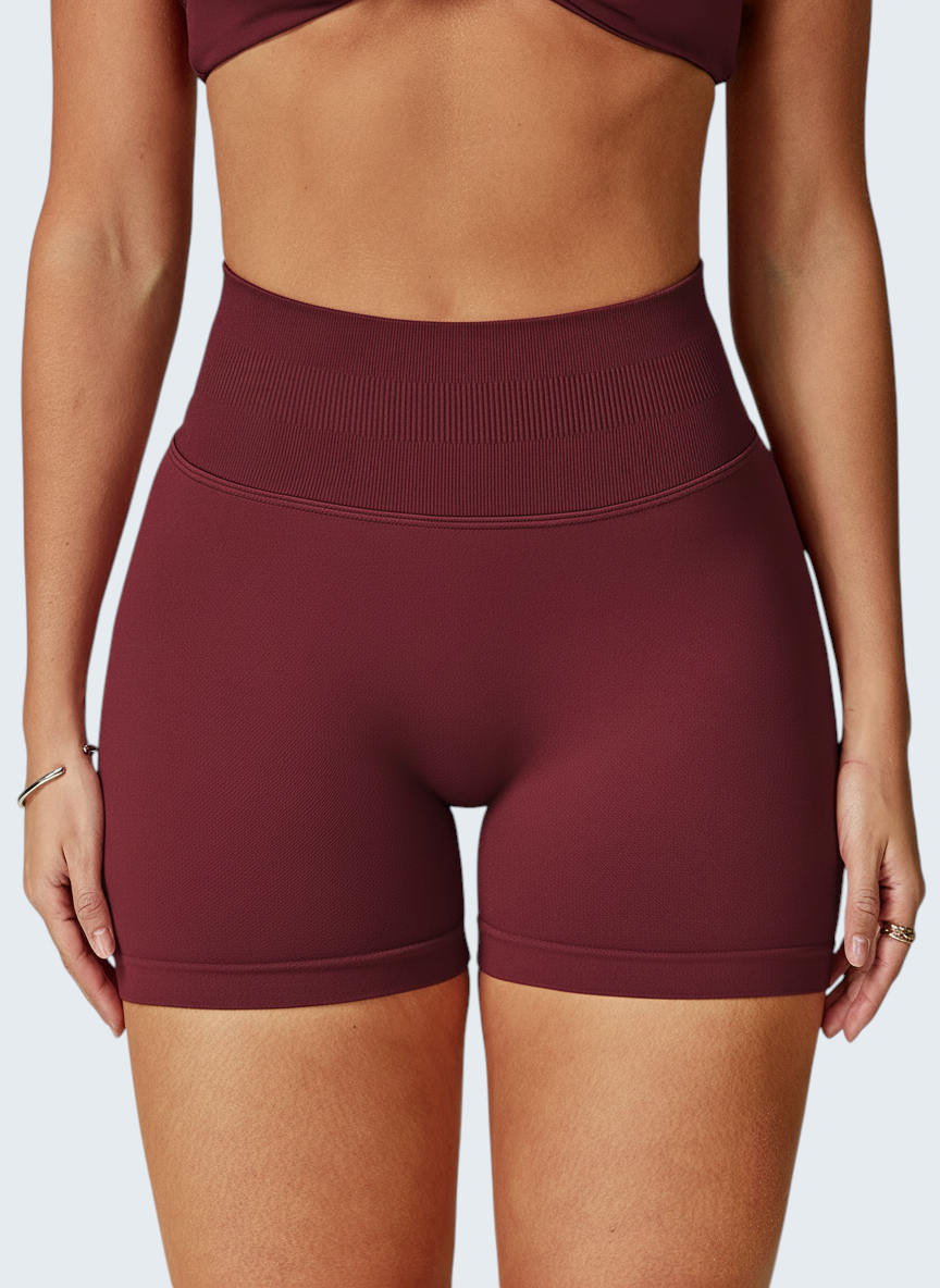 Shorts desportivos seamless de cintura alta VD Beyond Limits em tom bordô com efeito modelador e tecido elástico.